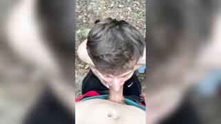 Young guy fellates ample dick in public