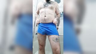 inked unshaved dude blows a load before taking a bathroom