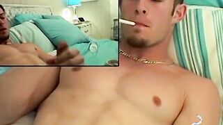 Mike Roberts blows a cloud of smoke while rubbing his cock