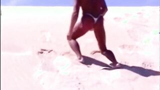 Tanned guy on beach in tiny string thong (temporarily!)