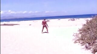 Tanned guy on beach in tiny string thong (temporarily!)