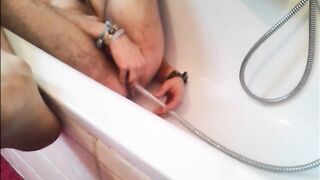 Twink Uses Shower Head for Enema and Masturbates