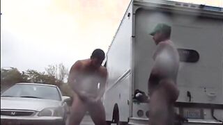 Public Rainy Stroking in a Parking Lot by Two Horny Men