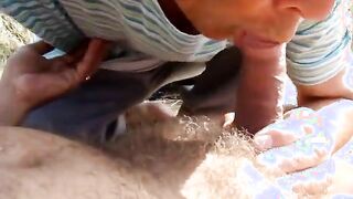 Old Man Blows Friend on Beach